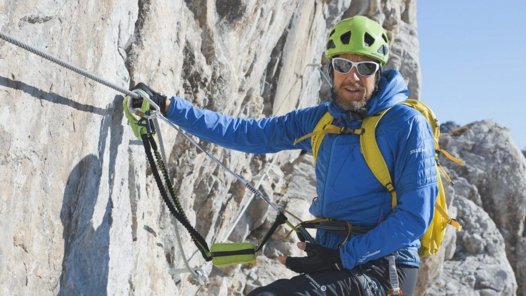 Via ferrata set with both load-bearing arms attached to the wire rope