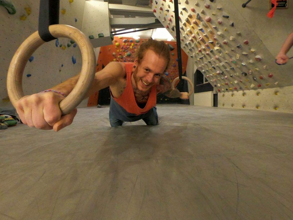 A female climber training indoors