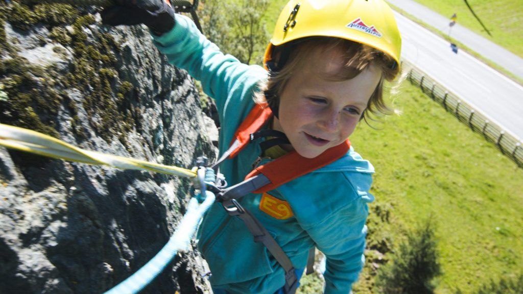 Climber puts on their harness