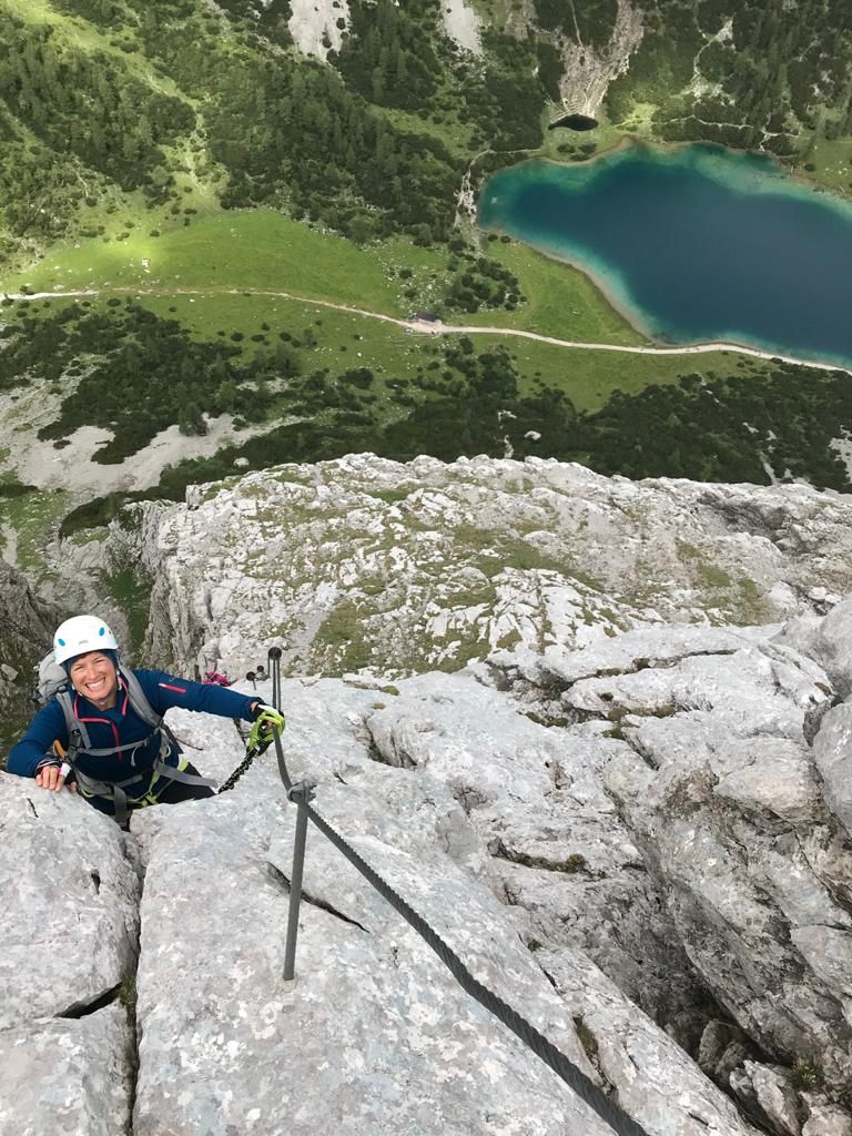 A via ferrata climber on the Tajakante above Lake Seebensee