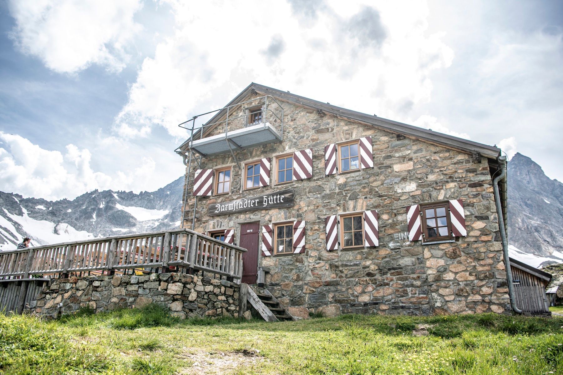 Guests dining on the terrace of the Darmstädter Mountain hut