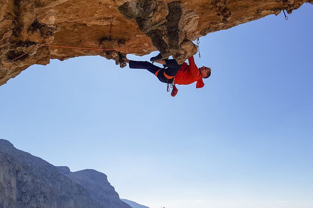 Mike Gabl is climbing an overhanging route